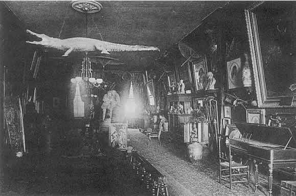 Interior of Napoléon Sarony's studio, with the famed stuffed crocodile suspended from the ceiling
